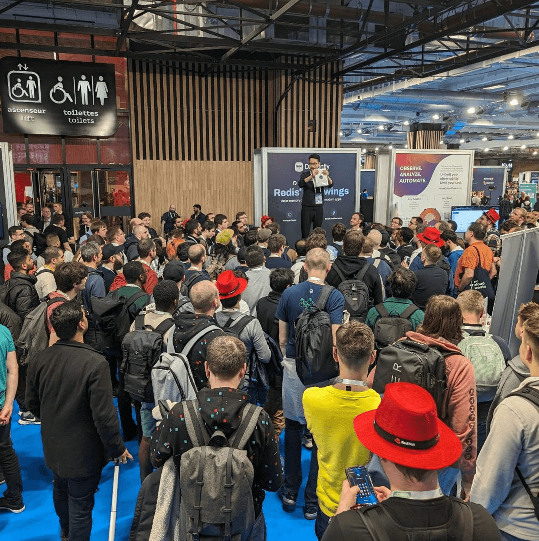 The Dragonfly booth at conference with a crowd of people