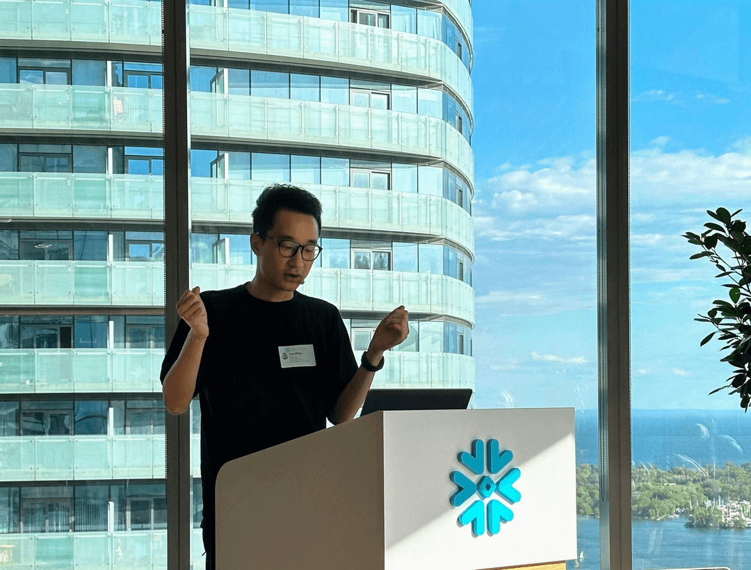 Dragonflies Zhoe giving a talk at a conference